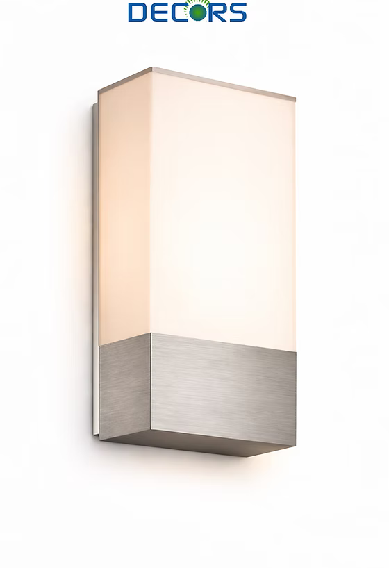 Modern wall light fixture with metallic finish on a white background, branded 'DECORS'.